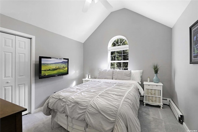 bedroom featuring carpet flooring, ceiling fan, baseboard heating, and a closet