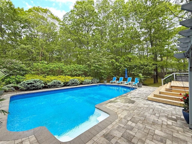 18 Diane Dr, Manorville, NY 11949 - outdoor pool with a patio