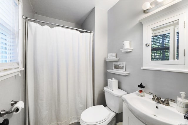 18 Diane Dr, Manorville, NY 11949 - full bathroom with toilet, plenty of natural light, vanity, and a shower with shower curtain