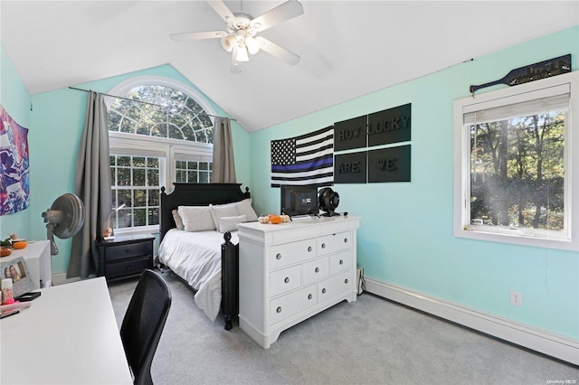18 Diane Dr, Manorville, NY 11949 - bedroom with a baseboard heating unit, vaulted ceiling, multiple windows, light colored carpet, and ceiling fan