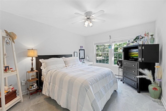 18 Diane Dr, Manorville, NY 11949 - bedroom featuring light carpet, a baseboard heating unit, and ceiling fan