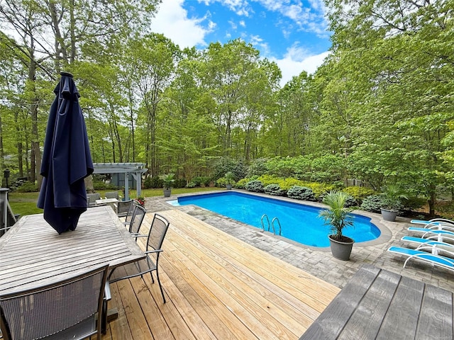 18 Diane Dr, Manorville, NY 11949 - swimming pool featuring a wooden deck and a pergola
