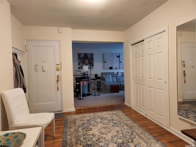 corridor with dark wood-type flooring