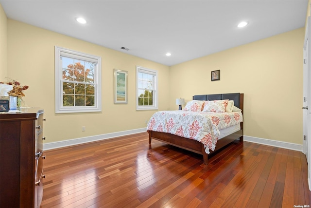 bedroom featuring wood-type flooring