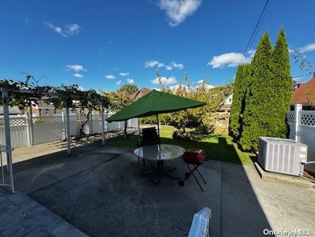 view of patio featuring cooling unit