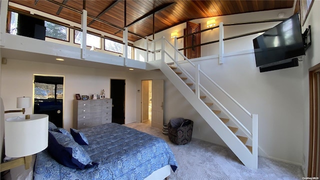 267 Great River Rd, Great River, NY 11739 - carpeted bedroom featuring wooden ceiling and high vaulted ceiling