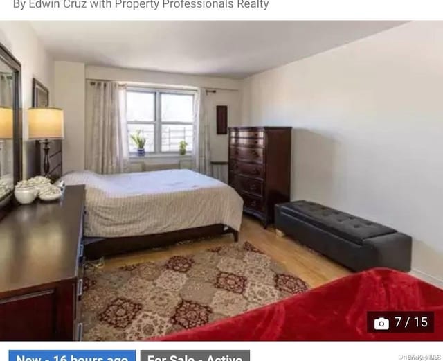 bedroom featuring light wood-type flooring