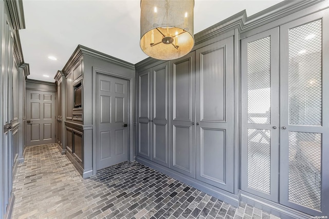 300 Maple St, Islip, NY 11751 - corridor with a decorative wall, brick floors, ornamental molding, and recessed lighting