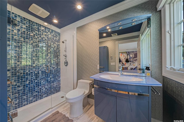 300 Maple St, Islip, NY 11751 - full bath featuring ornamental molding, a tile shower, vanity, toilet, and recessed lighting