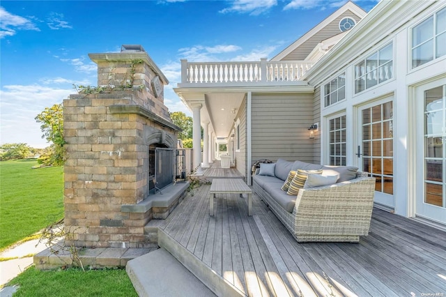 300 Maple St, Islip, NY 11751 - wooden deck with an outdoor living space with a fireplace