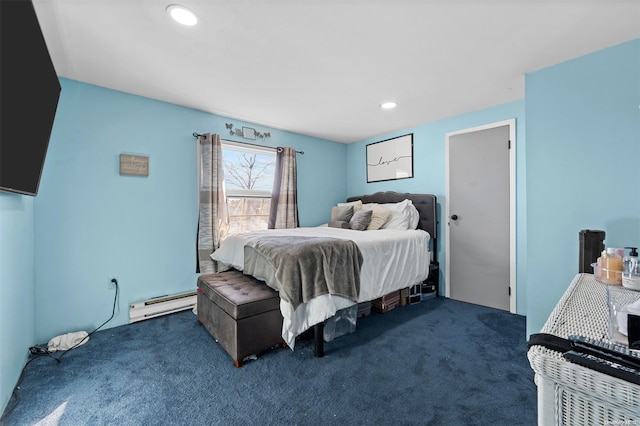 carpeted bedroom featuring a baseboard heating unit