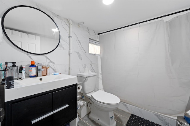 bathroom featuring toilet, vanity, tile walls, and walk in shower