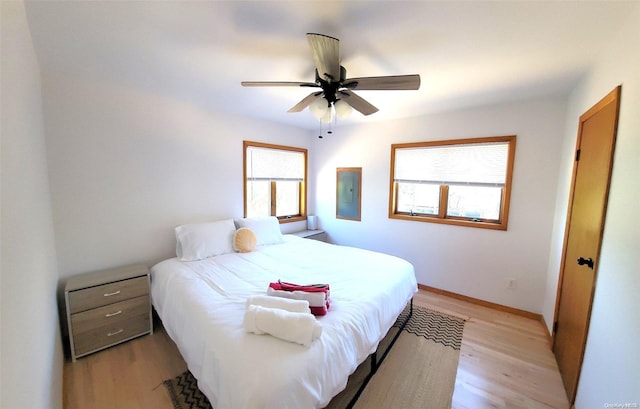 25 5th, Fair Harbor, NY 11706 - bedroom featuring light wood-type flooring and a ceiling fan
