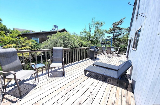 25 5th, Fair Harbor, NY 11706 - wooden terrace featuring outdoor dining area and grilling area