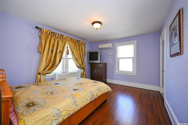 unfurnished bedroom featuring dark hardwood / wood-style flooring and an AC wall unit