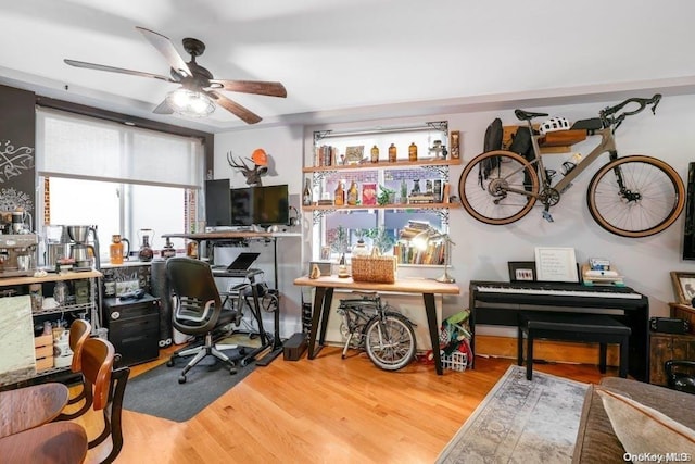 office space featuring ceiling fan and wood-type flooring