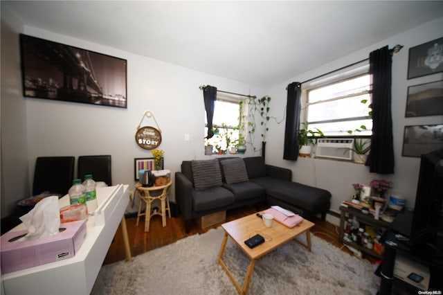 living room featuring hardwood / wood-style flooring and cooling unit