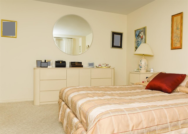 bedroom with light colored carpet