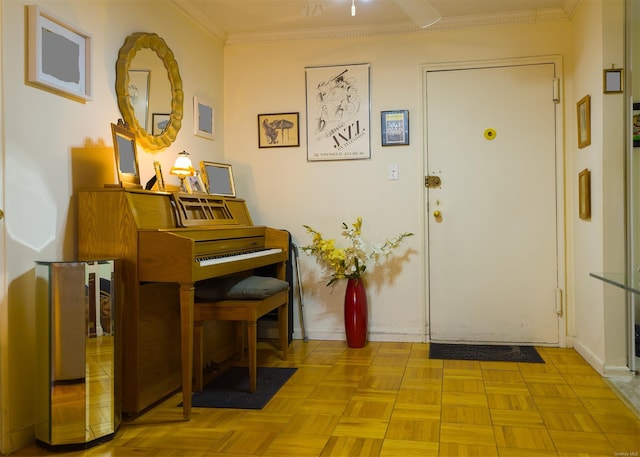 misc room featuring ornamental molding and light parquet flooring