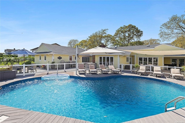 view of pool featuring a patio