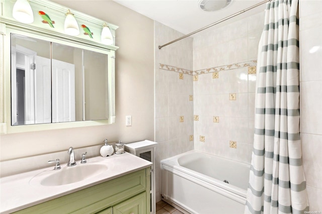 bathroom with vanity and shower / bath combo with shower curtain