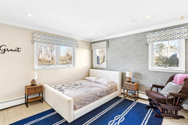 bedroom with multiple windows, crown molding, and wood-type flooring