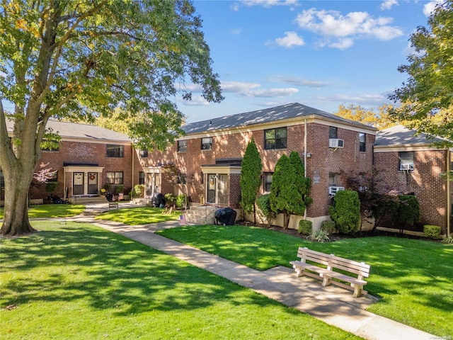 view of front of property with a front lawn