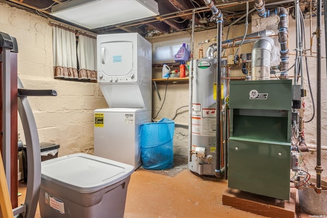 utility room featuring gas water heater and stacked washer / drying machine