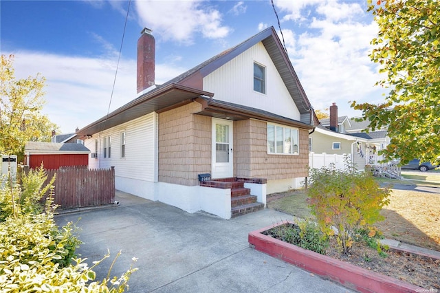 view of property exterior with a patio