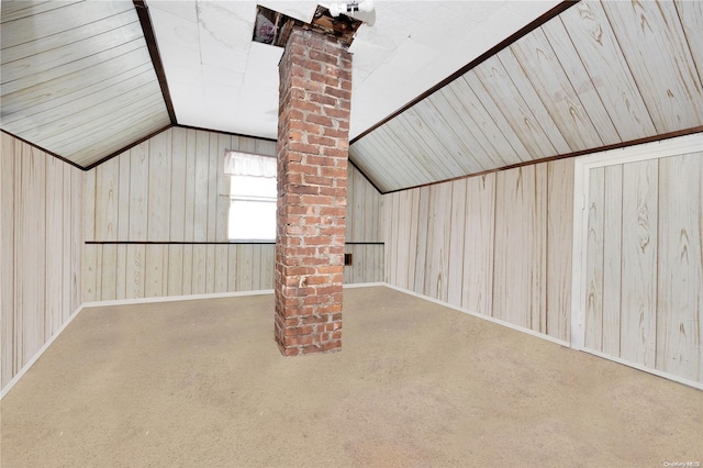 bonus room featuring wood walls, light carpet, and vaulted ceiling