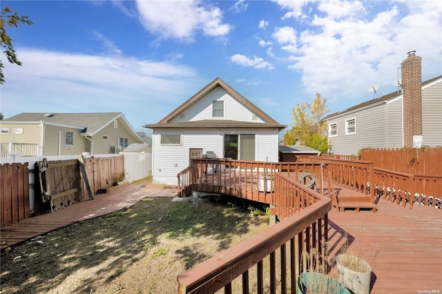 rear view of house with a deck