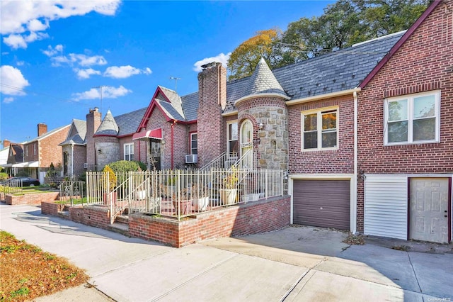 tudor home with a garage