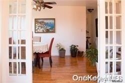 dining room featuring hardwood / wood-style flooring and ceiling fan