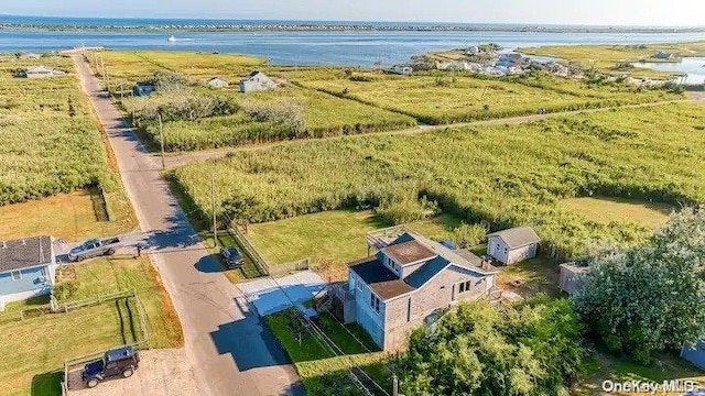 bird's eye view featuring a water view and a rural view