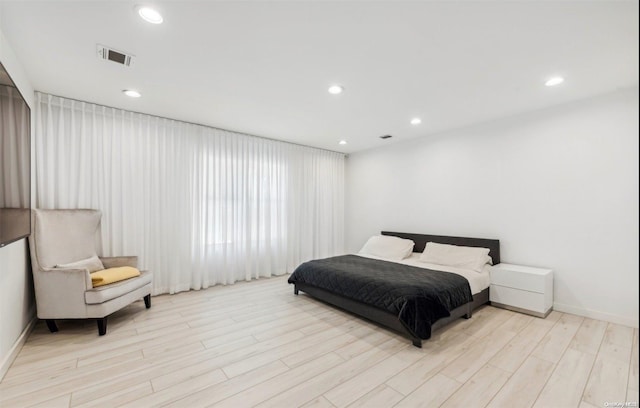 bedroom featuring light hardwood / wood-style flooring