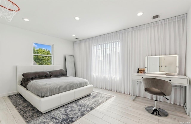 bedroom featuring wood-type flooring