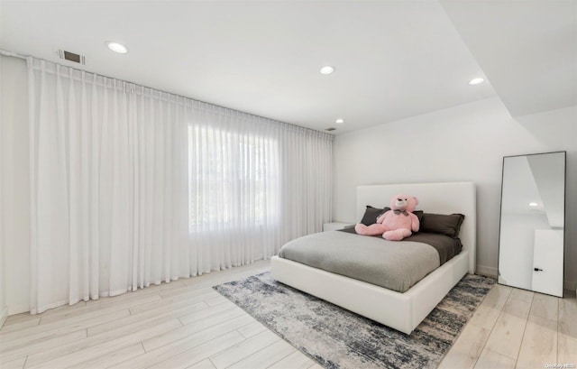 bedroom featuring light hardwood / wood-style flooring