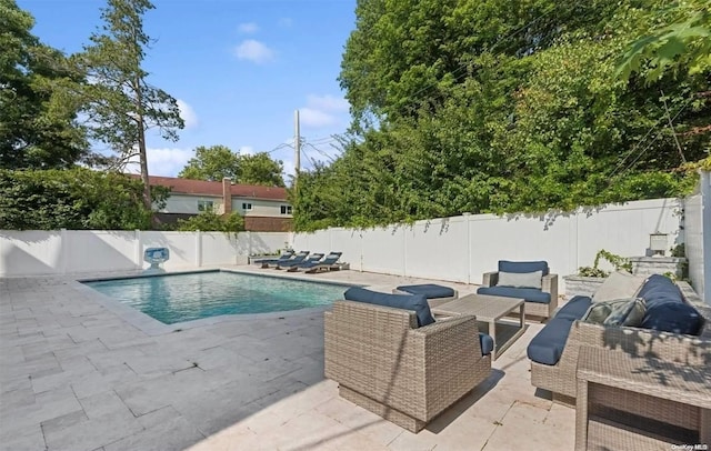 view of swimming pool featuring a patio