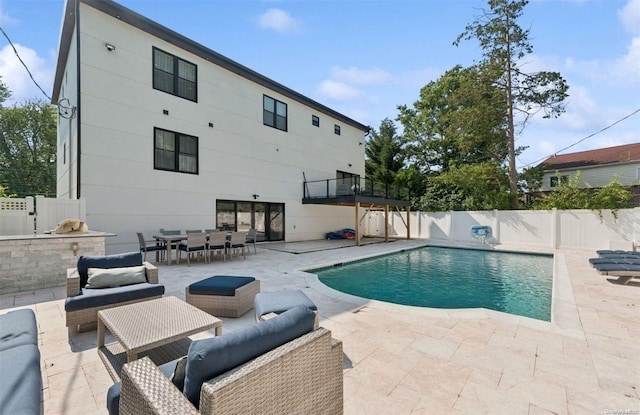 view of pool with an outdoor hangout area and a patio area