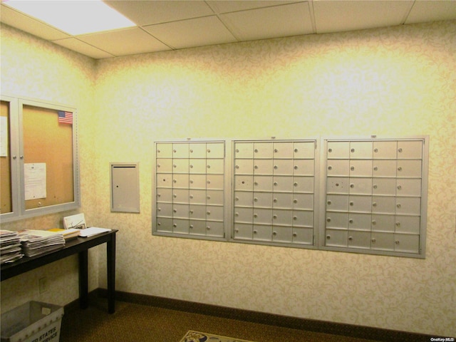 surrounding community featuring electric panel and a mail area