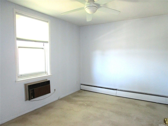 empty room with plenty of natural light, light colored carpet, a wall unit AC, and a baseboard heating unit