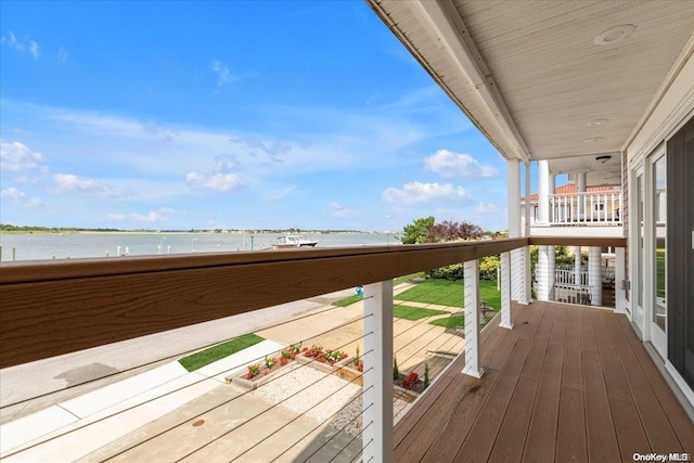 balcony featuring a water view