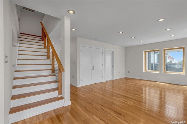 interior space with hardwood / wood-style flooring