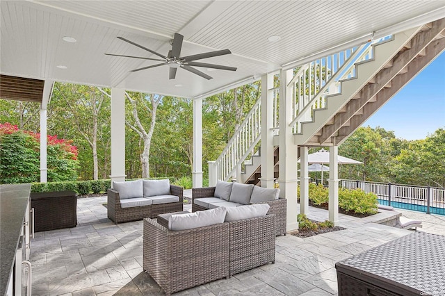 view of patio with an outdoor hangout area and ceiling fan