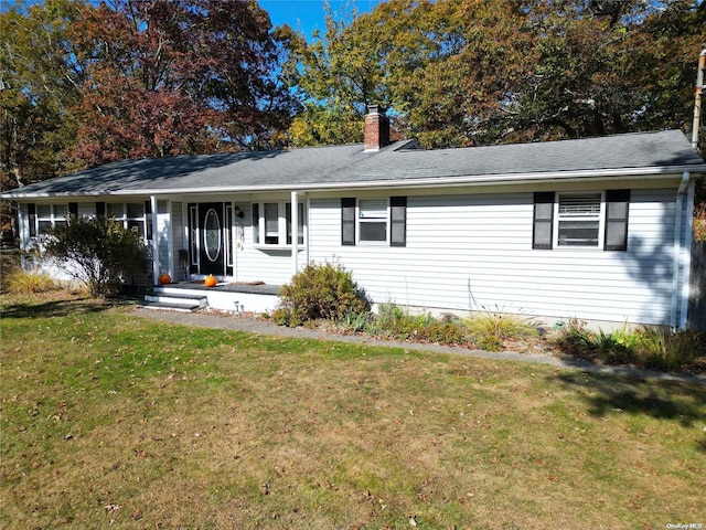 ranch-style house with a front yard