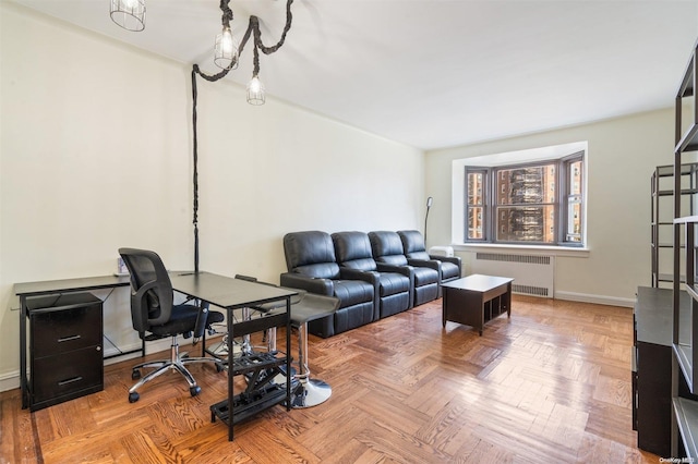 office featuring radiator and parquet flooring