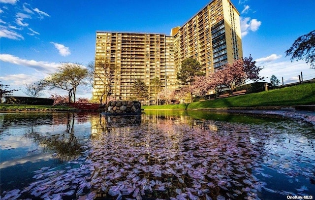 view of building exterior with a water view