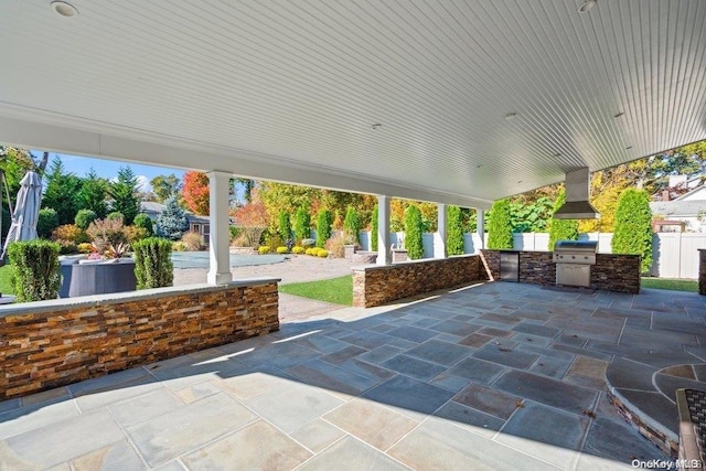 view of patio with a grill and exterior kitchen