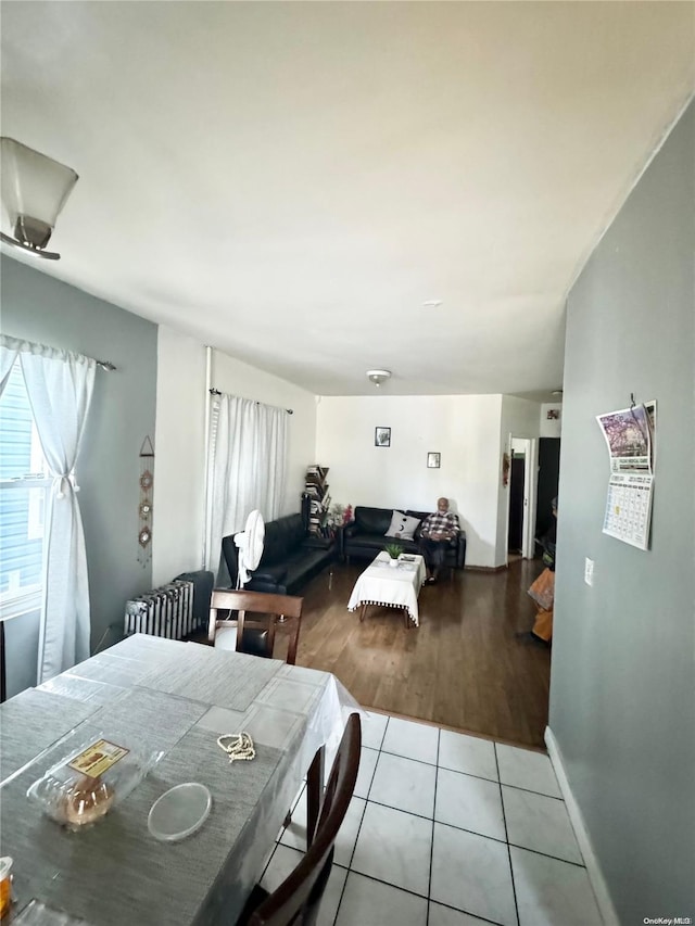 dining area featuring ceiling fan and light hardwood / wood-style floors