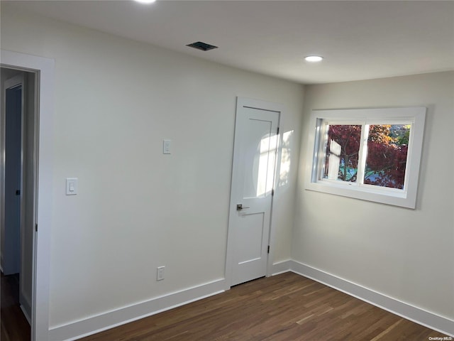 foyer featuring dark wood-type flooring